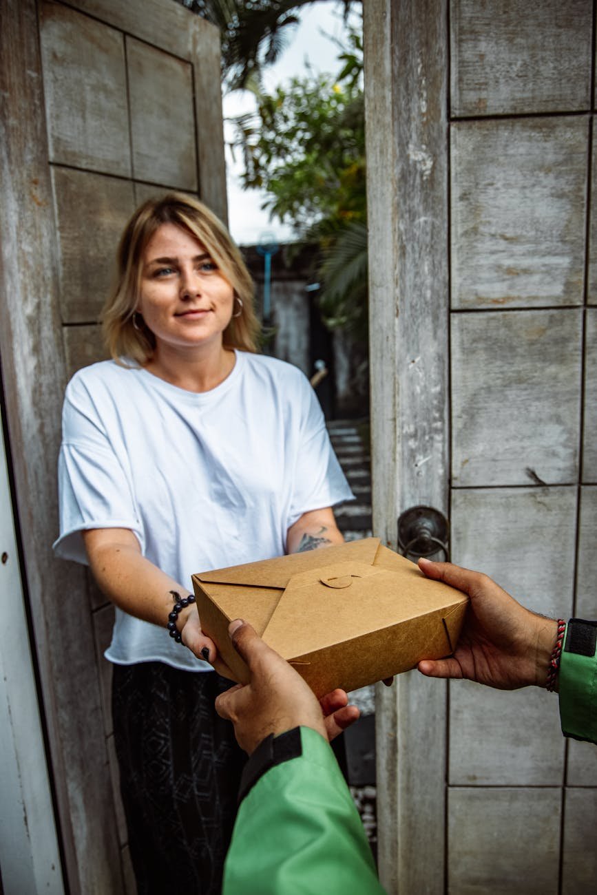 woman receiving takeout food flipkart